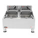 A large APW Wyott commercial countertop deep fryer with two baskets.
