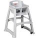 A close-up of a gray Rubbermaid high chair with a tray.