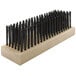 A Texas Brush carbon steel wire grill brush head with black bristles.