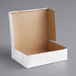 A white Baker's Mark half sheet cake box with the lid open.