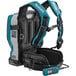 A blue and black Makita backpack vacuum with a remote control.