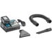 A black Makita XCV11T cordless wet/dry vacuum with white text on it.
