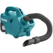 A blue and white Makita cordless handheld vacuum with a black tube.