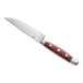 An Acopa steak knife with a full tang cherry finish Pakkawood handle.