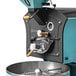 A Giesen commercial coffee roaster machine with a metal bowl.