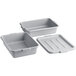 A grey polypropylene Choice drain box with flatware containers inside.