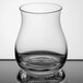 A close-up of a Stolzle Canadian Whiskey glass with a clear rim.