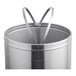 A Lancaster Table & Seating stainless steel decorative waste receptacle with a push door lid.