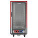 A red and silver Metro C5 heated holding and proofing cabinet with clear doors.
