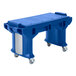 A blue plastic table cart with wheels.