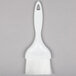 A white Royal Industries nylon bristle pastry/basting brush with a white handle on a gray surface.