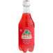 A close up of a Jarritos Fruit Punch Soda bottle with a red label.