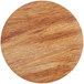 A circular wood and marble Enjay charcuterie board.