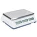 A white rectangular Cardinal Detecto digital price computing scale with a silver edge.