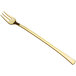 A Visions gold plastic fork with a handle.