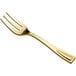 A close-up of a Visions gold plastic tasting fork.