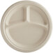 A close-up of a World Centric white compostable fiber plate with three compartments.