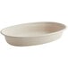 A white oval World Centric compostable fiber bowl with a white background.