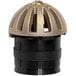 A close-up of the Guardian Drain Lock for floor sinks, a metal device with a black plastic and gold metal dome.