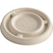A white World Centric compostable fiber lid with a logo on it.