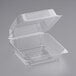 A World Centric clear PLA hinged clamshell container with a lid open.