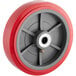 A red and gray wheel with a gray rim for a Lavex cart.