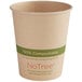 A World Centric paper hot cup with a green label.