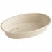 A white oval World Centric fiber bowl with a hole in the middle.