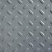 A close up of a metal surface with holes.