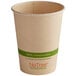 A World Centric paper hot cup with a green NoTree label.