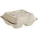 A white World Centric compostable fiber clamshell container with 3 compartments and a lid.