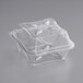 A World Centric clear compostable PLA hinged clamshell container with a lid.