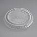 A clear World Centric compostable plastic lid with a circular shape.