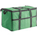 A green insulated nylon cooler bag with black straps.
