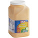 A plastic container of Kraft Honey Mustard Dressing.