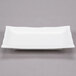 A CAC white rectangular porcelain platter with a square edge.