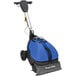 A blue and black Powr-Flite Powr-Scrub floor scrubber with a handle.