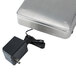 A silver Cardinal Detecto digital portion scale with a power cord.