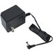 A black power adapter with a cord and metal corners.