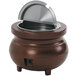 A brown Vollrath Colonial kettle with a metal lid.