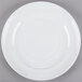A Tuxton Concentrix white china plate with a spiral design.