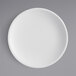 An American Metalcraft white matte melamine coupe plate on a gray surface.