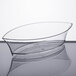 A clear plastic container on a white surface.