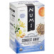A box of Numi Organic Congest Away Herbal Tea Bags with a product label.