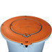 An orange round adapter lid for a Thermaco Trapzilla solids separator.