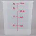 A translucent Cambro CamSquares polypropylene food storage container with measurements on the side and red writing.