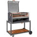 A Nuke BBQ Delta charcoal grill on a cart with a wooden tray.