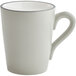 A grey matte stoneware mug with a handle.