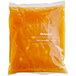 A plastic bag of Oringer cheesecake ice cream base with orange and white packaging.