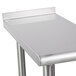 An Advance Tabco stainless steel filler table with a stainless steel base.